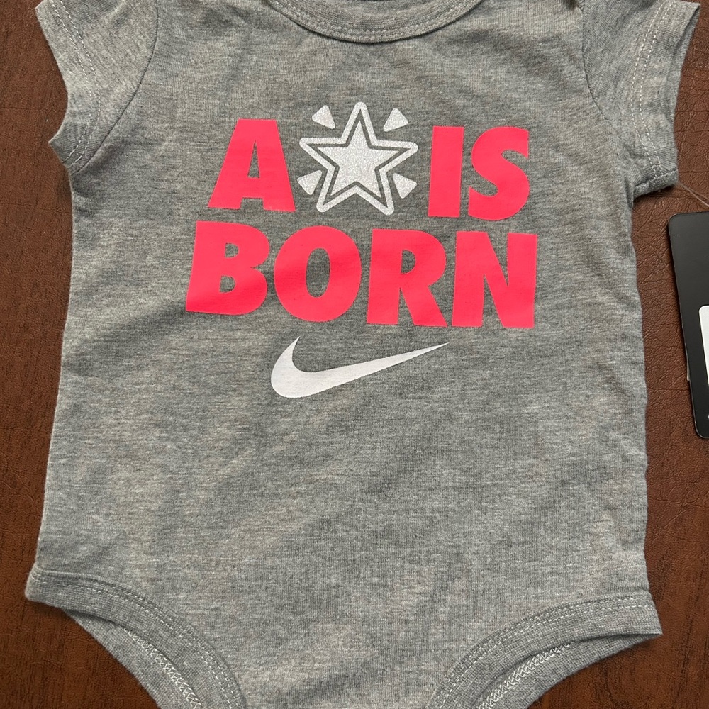 Nike Gray Baby Onesie with Pink Print